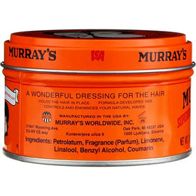 Barbershop tools with Murray's tins conveying professional styling convenience