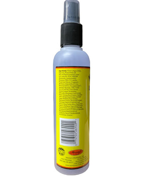Murray's Unlock Spray texture on hand illustrating lightweight slip and quick absorption benefit