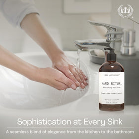 Muse Apothecary bottle beside a hand to show 16 oz scale and ease