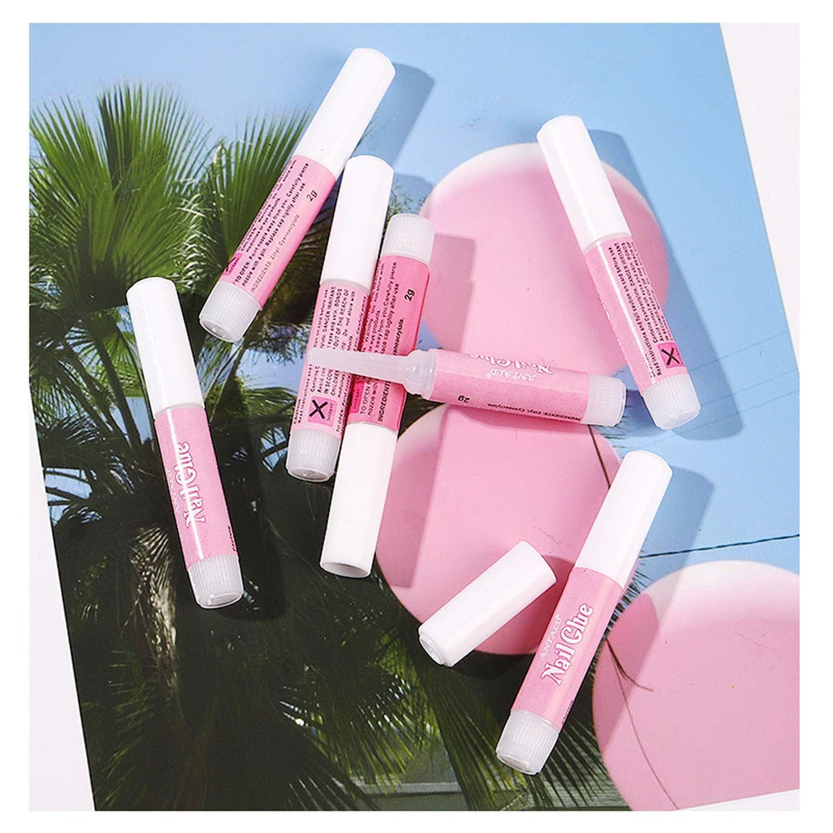 MUSILAN securing rhinestone nail art to show strong adhesive hold