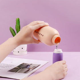 Muslish silicone bottle close-up of leak-proof valve showing secure spill protection