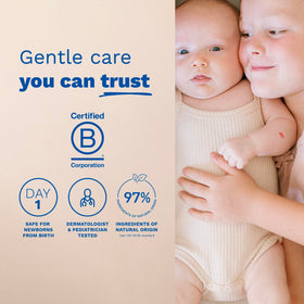 Mustela being sprayed on baby blanket to freshen linens safely
