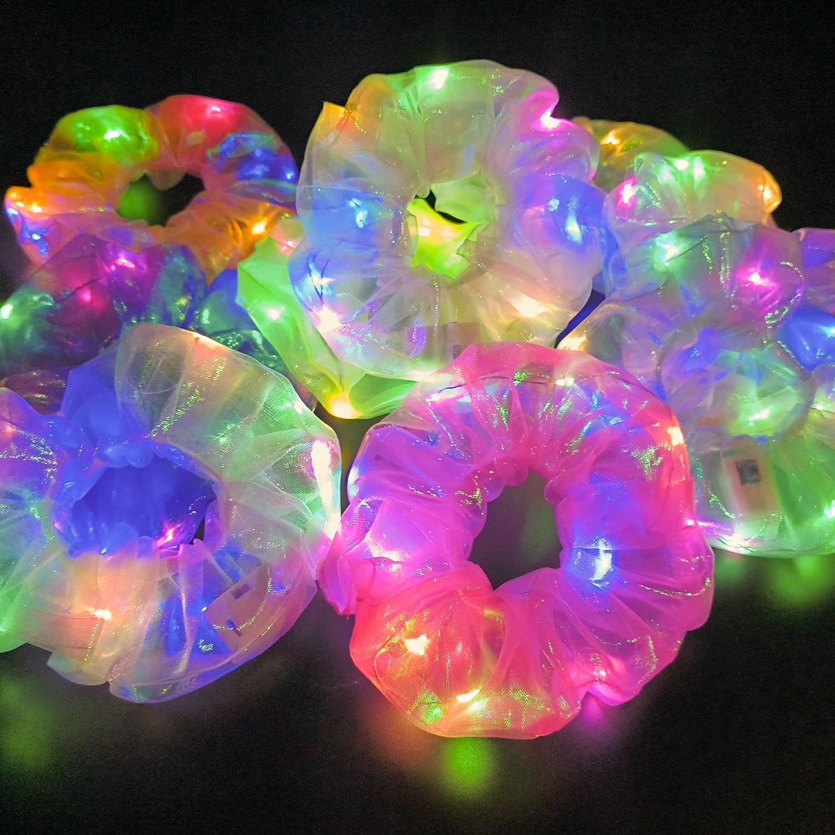 MUYANN scrunchies in party scene showing group glow coordination