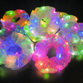 MUYANN scrunchies in party scene showing group glow coordination