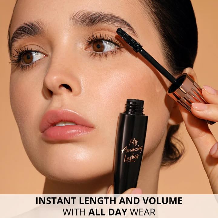 My Amazing Lashes tube beside a coin showing compact size for travel convenience