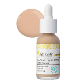 MyChelle Sun Shield applied as a primer on skin illustrating oil control and prep