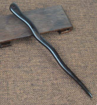 Myhsmooth two sticks crossed in hair demonstrating stronger hold and decorative finish