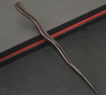 Myhsmooth hair sticks securing a bun showing reliable hold and elegant look