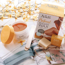 Nad's smooth skin close-up after waxing showing salon-like finish