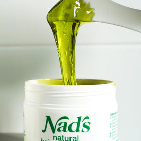 Nad's cleansing wipe packet open showing pre-wax preparation benefit