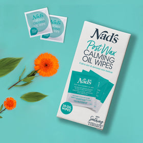 Nad's wipe being pulled from pack showing easy one-handed opening and hygienic access