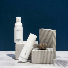 NAELI moisturizer being smoothed on neck and jawline for firming benefits