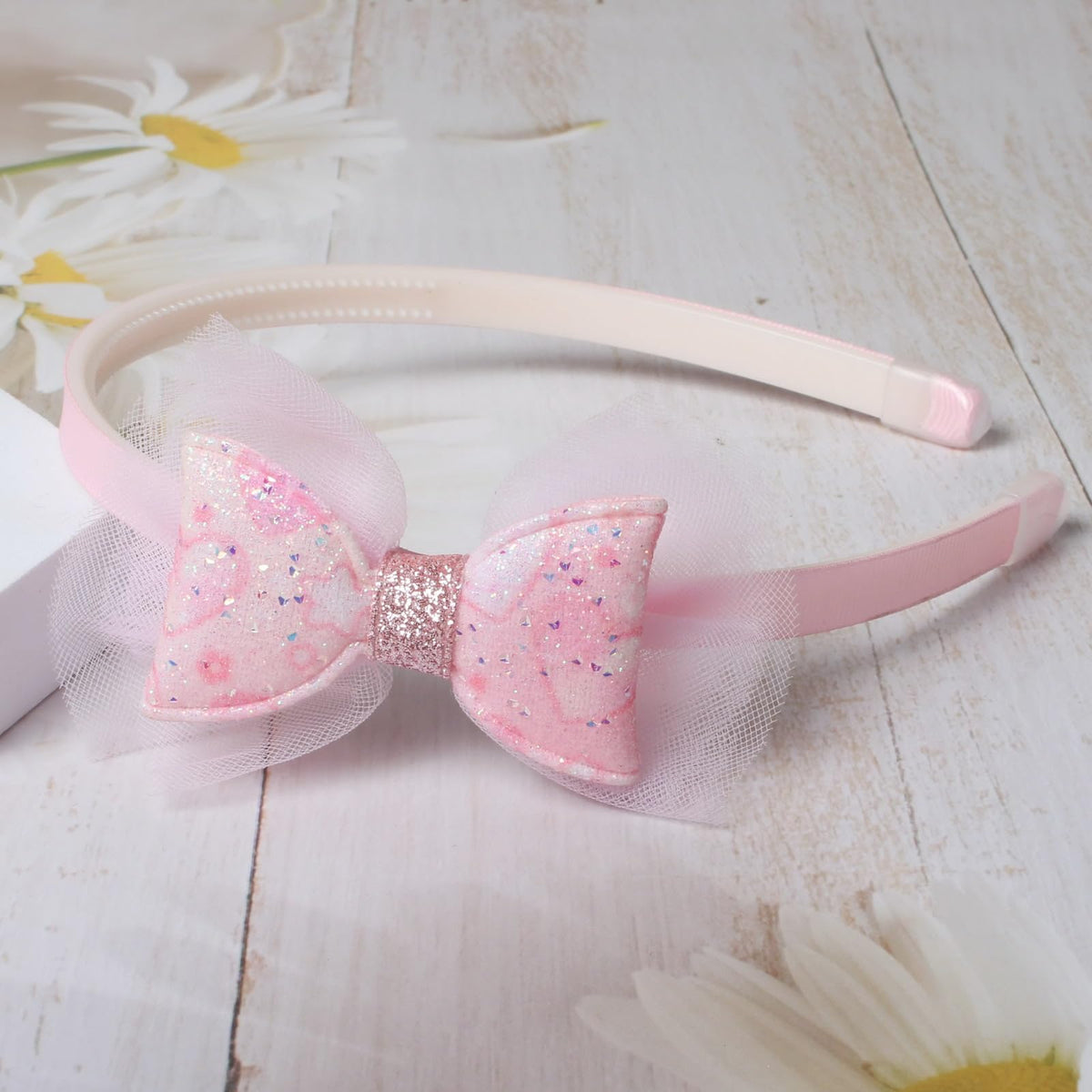 naibirdr headband next to ruler demonstrating 0.39 inch width and scale