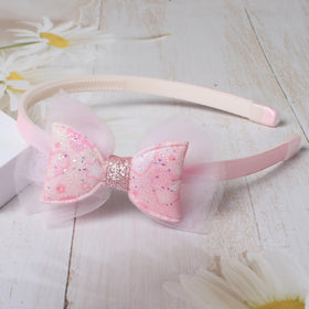 naibirdr headband next to ruler demonstrating 0.39 inch width and scale
