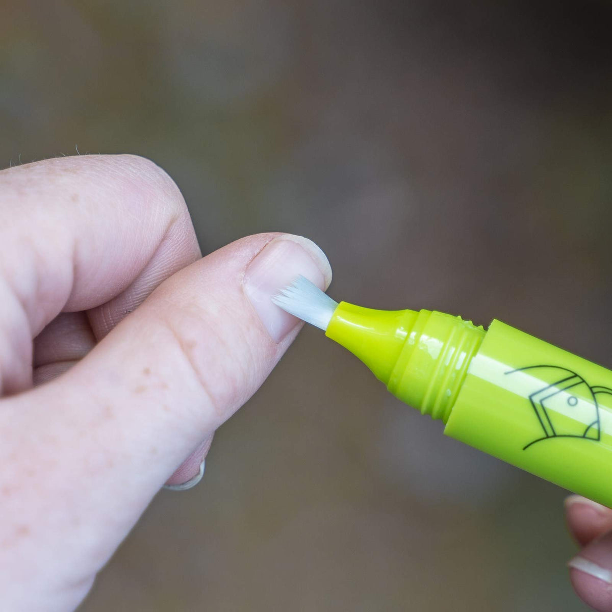 Nail Quail brush tip close-up for precise nail and cuticle coverage