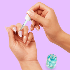 Nail Tek dropper demonstrating product control and precise application benefit