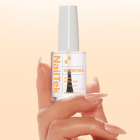 Close-up of Nail Tek formula texture on brush, protein-enriched detail benefit