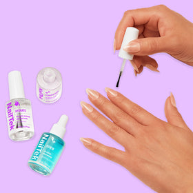 Nail Tek Strengthen brush applying coat to nail for stronger surface benefit