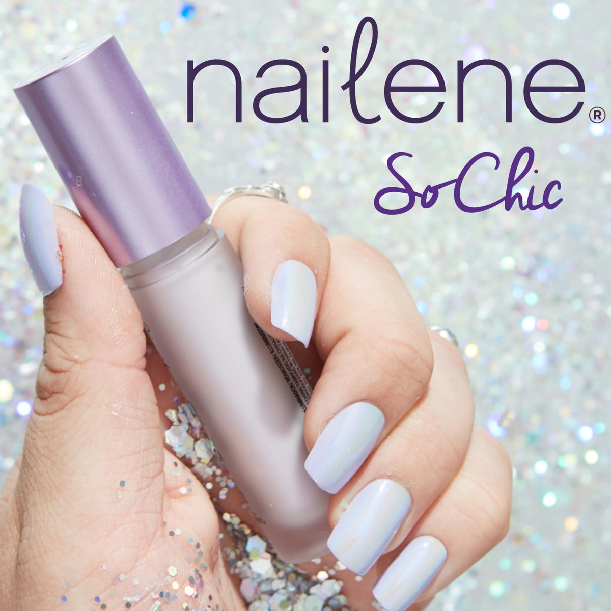 Nailene repairing a cracked nail with focused glue for discreet fix