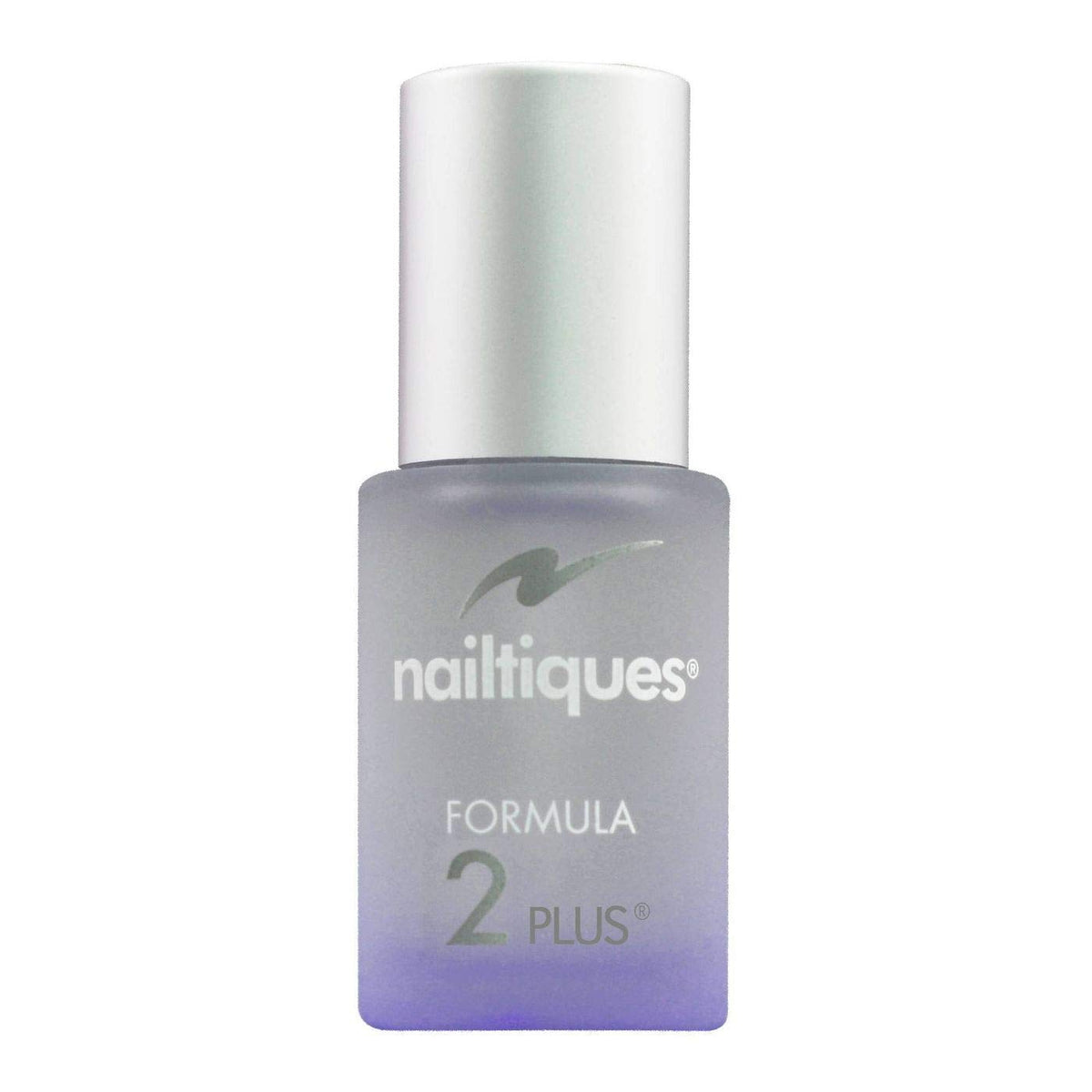 Nailtiques brush applying formula to nail edge to build strength and reduce peeling