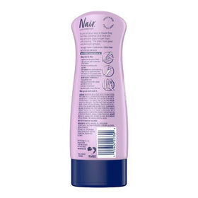 Nair close-up pump dispensing lotion, showing smooth texture for easy spread
