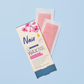 Nair used strip with removed hairs showing effective hair removal result