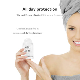 nakd travel stick held in hand to show compact size benefit