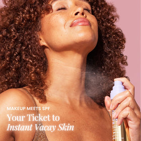 Naked Sundays mist spraying on face to protect and refresh makeup outdoors