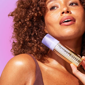 Naked Sundays bottle inside a travel bag emphasizing on-the-go sun protection