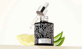Naked & Thriving bottle on bathroom counter in routine scene offering easy layering benefit