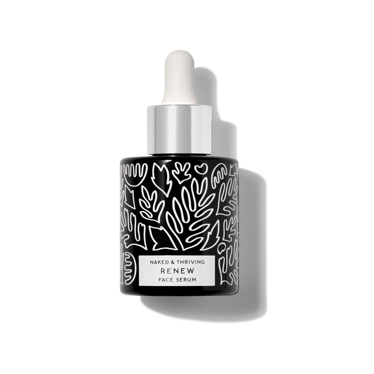 Naked & Thriving bottle on bedside table suggesting nightly resurfacing and restorative benefit
