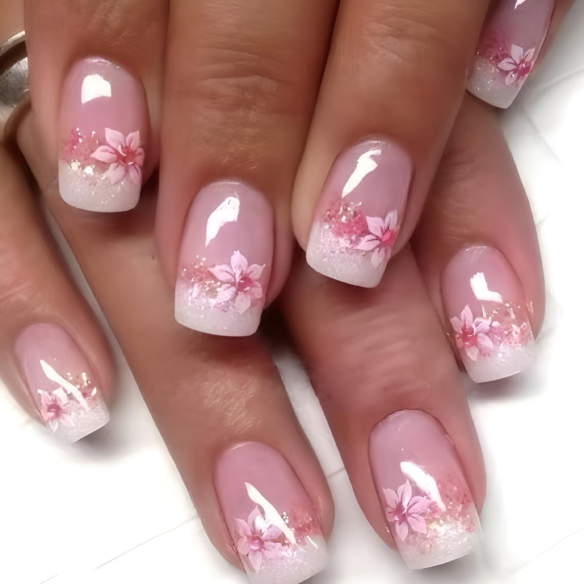 Namrec removed false nails stored for reuse, illustrating kit value and longevity