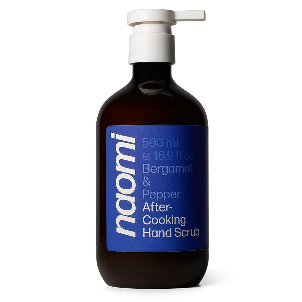 Naomi bottle front view showing bergamot and pepper scent benefits