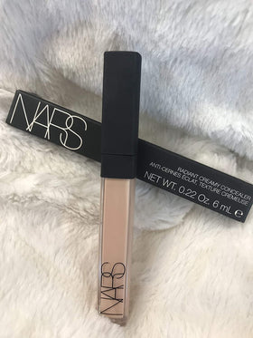 NARS concealer swatch on arm illustrating No. 2.5 Crème Brûlée color match