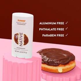 Person applying Native Boston Kreme deodorant for long-lasting odor protection during day