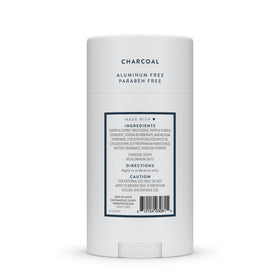 Native charcoal label detail close-up showing ingredient highlights and clean formulation