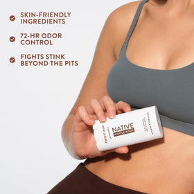 Native stick held in hand to show 2.3oz scale, brand offering travel-friendly size