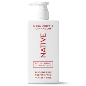 Native front packaging showing warm cider cinnamon scent and 16.5 fl oz benefit: clear branding
