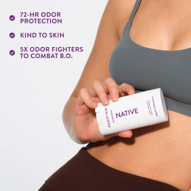Native deodorant held in hand for size comparison and travel-friendly convenience
