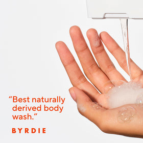 Native bottle with poured foam on hand illustrating rich moisturizing lather