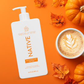 Swatch of Native Pumpkin Spice Latte lotion texture on skin highlighting moisturizing, non-greasy finish benefit