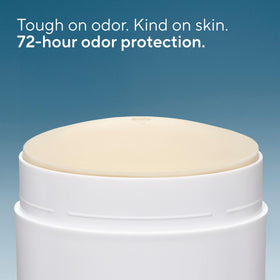 Native applying stick to underarm demonstrating easy glide and protection