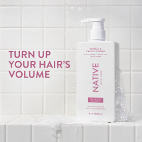 Native shampoo bottle label close-up highlighting natural ingredient claim