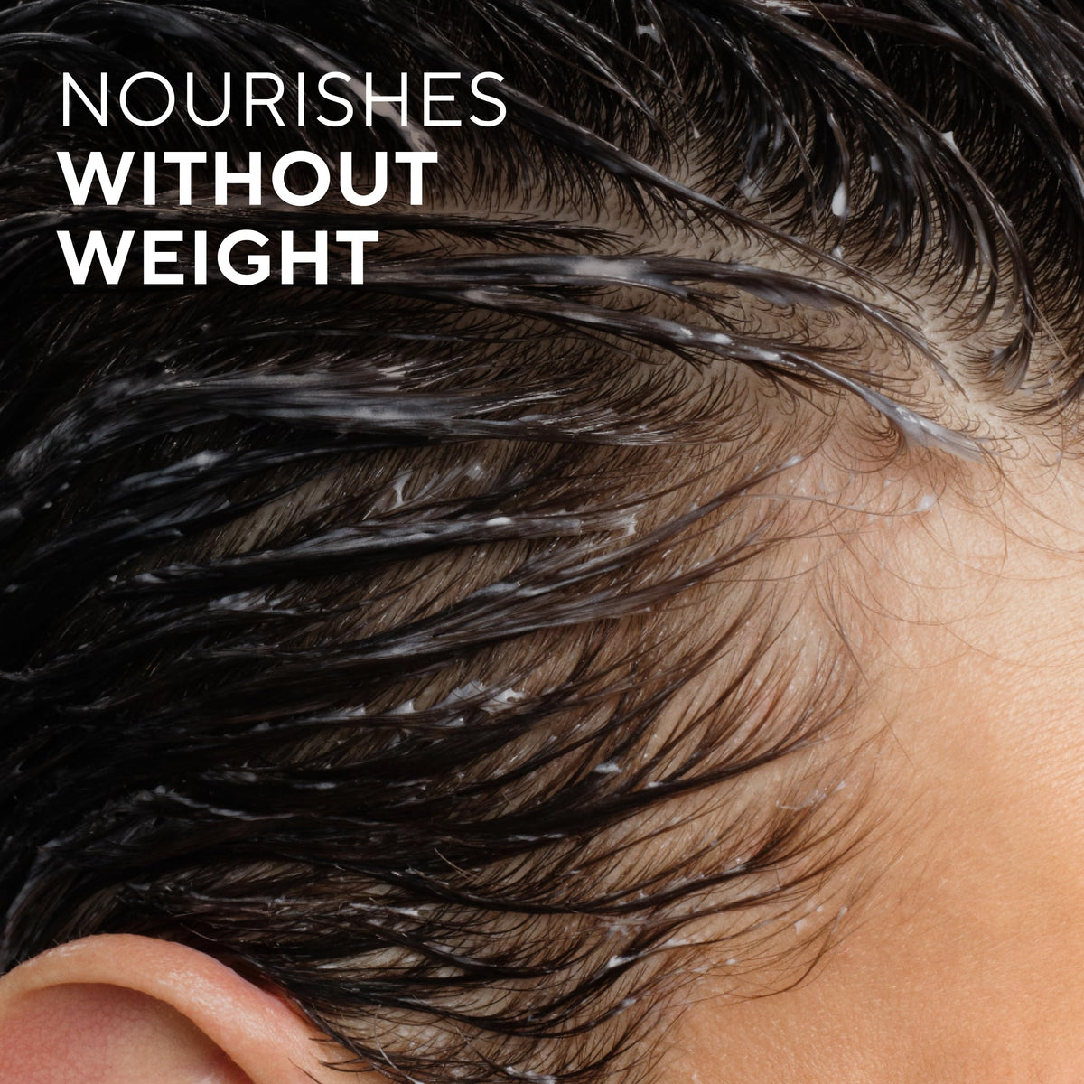 Native in-shower wet hair with lather demonstrating gentle cleansing benefit
