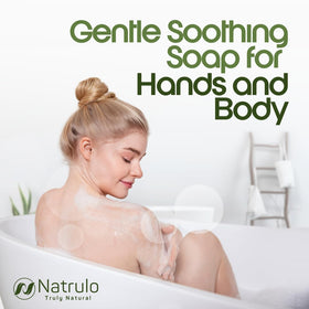 Natrulo soap beside moisturizer in bath setting for a calming skincare routine