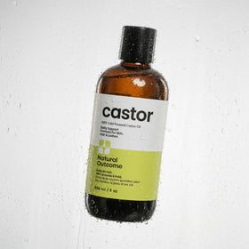 natural outcome size comparison with hand showing 8 oz bottle scale