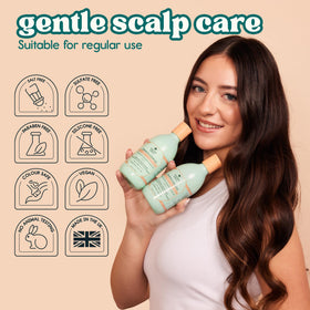 Nature Spell conditioner application on ends demonstrating detangling hydration