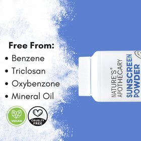 Nature's Apothecary applying powder with brush for quick sun protection