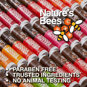 Nature's Bees tubes tucked in purse illustrate travel-ready lip care convenience