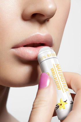 Naturistick lifestyle winter purse with balm ready showing on-the-go lip care benefit
